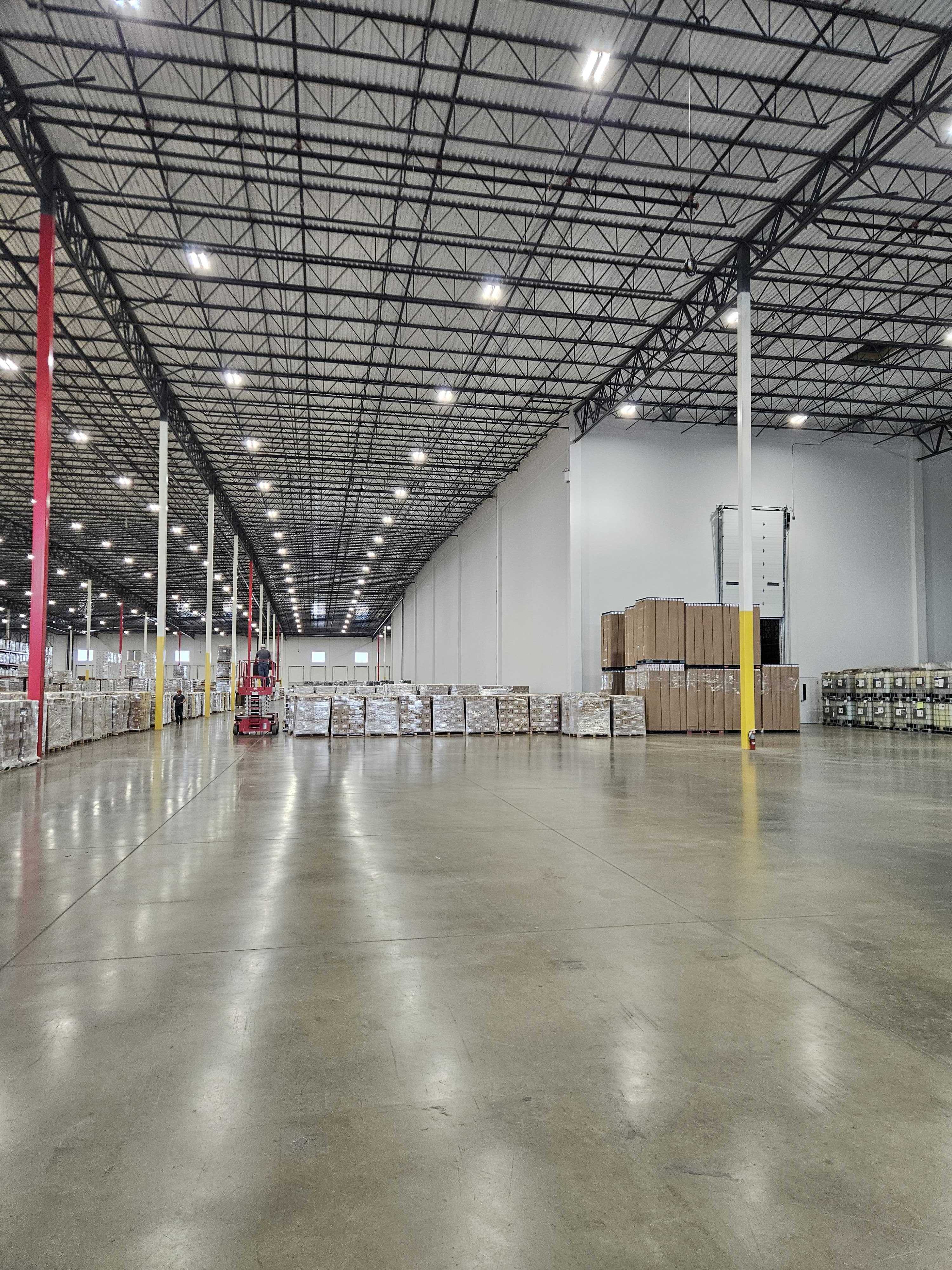 Pallets and dock doors on a distribution center floor