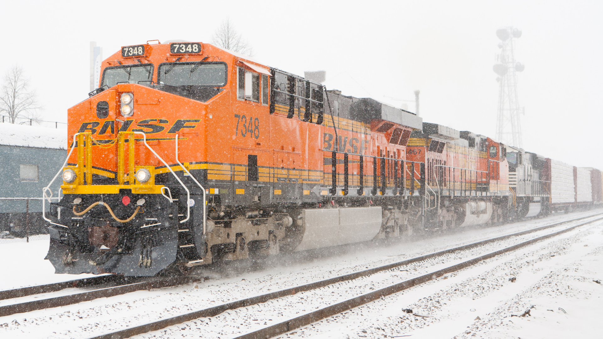 Freight locomotive at a rail checkpoint in snow